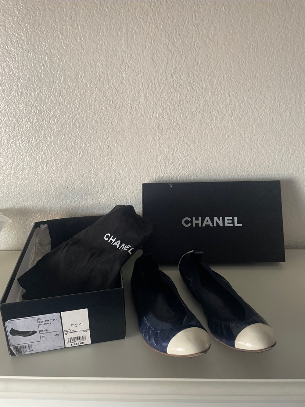 CHANEL Navy and Ivory Quilted Cap-Toe Ballet Flats